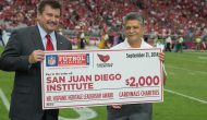 Tommy Espinoza received donation for San Juan Diego Institute