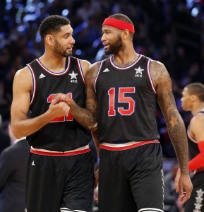 Tim Duncan, de los Spurs, y DeMarcus Cousins, de los Kings, jugaron por el Oeste en el All-Star de la NBA. Foto: AP