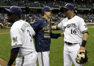 Milwaukee Brewers manager Craig Counsell celebrates with Elian Herrera (3) and Aramis Ramirez (16) after a baseball game against the Los Angeles Dodgers Monday, May 4, 2015, in Milwaukee. The Brewers won 4-3. (AP Photo/Morry Gash)