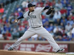 Seattle Mariners' Felix Hernandez delivers a pitch against the Texas Rangers during the first inning of a baseball game, Wednesday, April 29, 2015, in Arlington, Texas. (AP Photo/Tony Gutierrez)