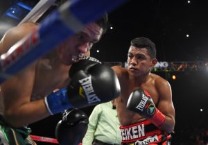 Roman Gonzalez, right, of Nicaragua, connects a right to Edgar Sosa, of Mexico, during a WBC flyweight world championship boxing bout, Saturday, May 16, 2015, in Inglewood, Calif. (AP Photo/Mark J. Terrill)