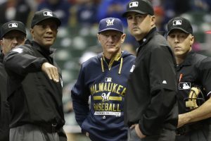 MILWAUKEE, WI - APRIL 24: Ron Roenicke #10 of the Milwaukee Brewers talks to the umpires before the start of the game against the St. Louis Cardinals at Miller Park on April 24, 2015 in Milwaukee, Wisconsin. (Photo by Mike McGinnis/Getty Images)