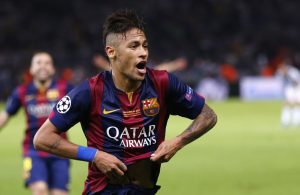 Barcelona's Neymar celebrates after scoring his side's third goal during the Champions League final soccer match between Juventus Turin and FC Barcelona at the Olympic stadium in Berlin Saturday, June 6, 2015. (AP Photo/Michael Probst)