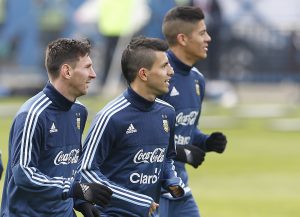 Argentina's Lionel Messi, from left, Sergio Aguero, and Marcos Rojo, jog during a training session in Concepcion, Chile, Wednesday, July 1, 2015. Argentina defeated Paraguay 6-1 on Tuesday and will face Chile in the final of Copa America soccer tournament Saturday. (AP Photo/Andre Penner)