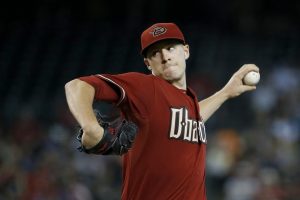 Arizona Diamondbacks' Patrick Corbin throws a pitch against the San Francisco Giants during the first inning of a baseball game Sunday, July 19, 2015, in Phoenix. (AP Photo/Ross D. Franklin)