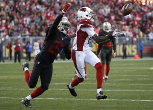 Arizona Cardinals wide receiver J.J. Nelson, right, catches a pass in front of San Francisco 49ers strong safety Jimmie Ward during the second half of an NFL football game in Santa Clara, Calif., Sunday, Nov. 29, 2015. (AP Photo/Tony Avelar)