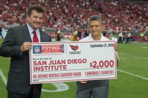 Michael Bidwell, owner of the Arizona Cardinals, and Tommy Espinoza, President and CEO of Raza Development Fund (RDF). Photo: Phil Soto 
