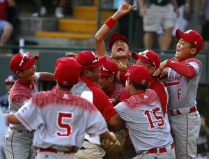 Japan celebrates after winning the Little League World Series Championship baseball game over Lewisberry, Pa. in South Williamsport, Pa., Sunday, Aug. 30, 2015. Japan won 18-11. (AP Photo/Gene J. Puskar)