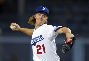Los Angeles Dodgers starting pitcher Zack Greinke throws to the plate during the first inning of a baseball game against the Pittsburgh Pirates, Friday, Sept. 18, 2015, in Los Angeles. (AP Photo/Mark J. Terrill)