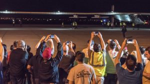 Spectators turned out to watch the Solar Impulse 2 solar airplane land at Phoenix Goodyear Airport Monday night